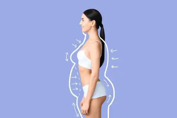 image of woman experiencing fat reduction treatment East Sussex