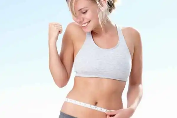 woman happy after fat reduction treatment East Sussex