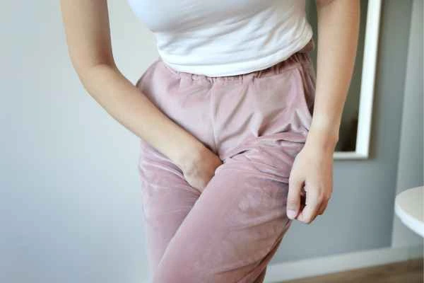 older woman running to the toilet because of urinary incontinence East Sussex