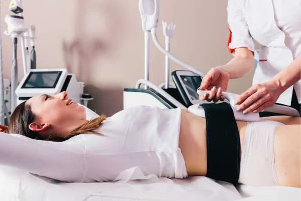 woman having body sculpting to help improve her body image and her mental health East Sussex